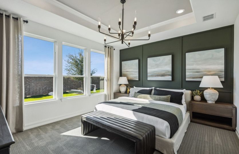 Owner's suite with large windows*model representation