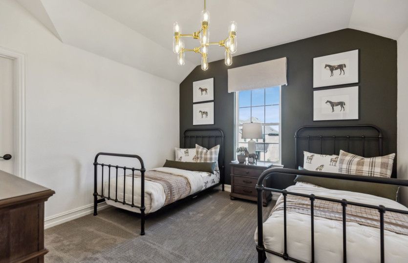 Spacious secondary bedroom*model representation
