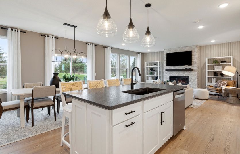 Seamless spaces that bring living, dining, and entertaining together.