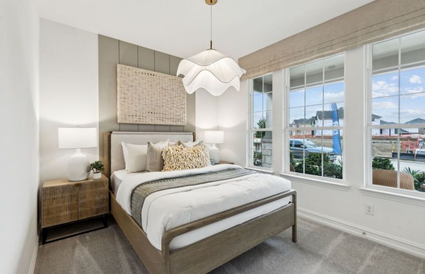 Spacious secondary bedroom *model representation