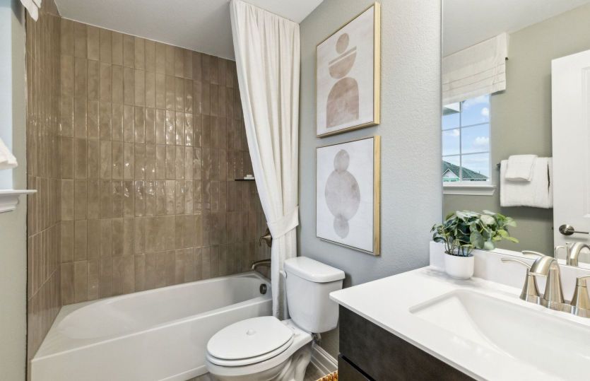 Spacious secondary bathroom *model representation