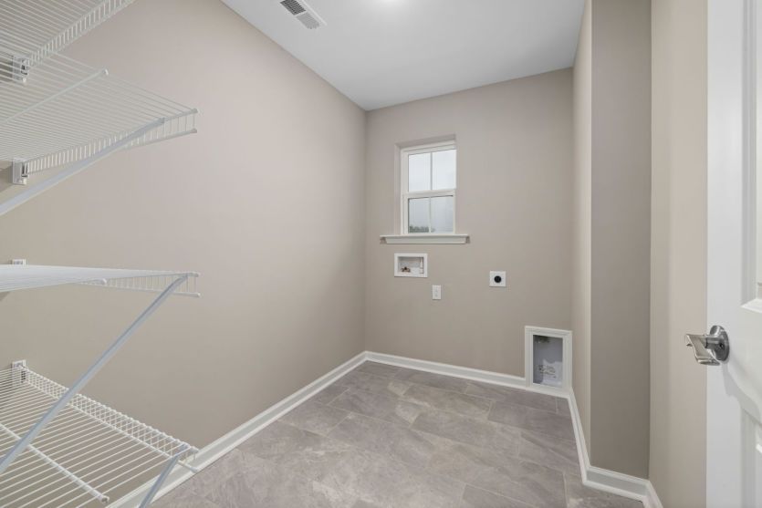 Large Laundry Room offers Shelving for Storage - Model Representation