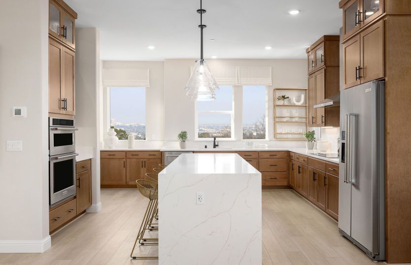 Impressive kitchen with waterfall edge island