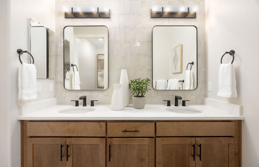 Owner's bathroom with double vanity sinks