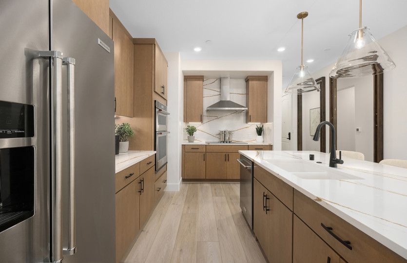 Kitchen with full slab backsplash