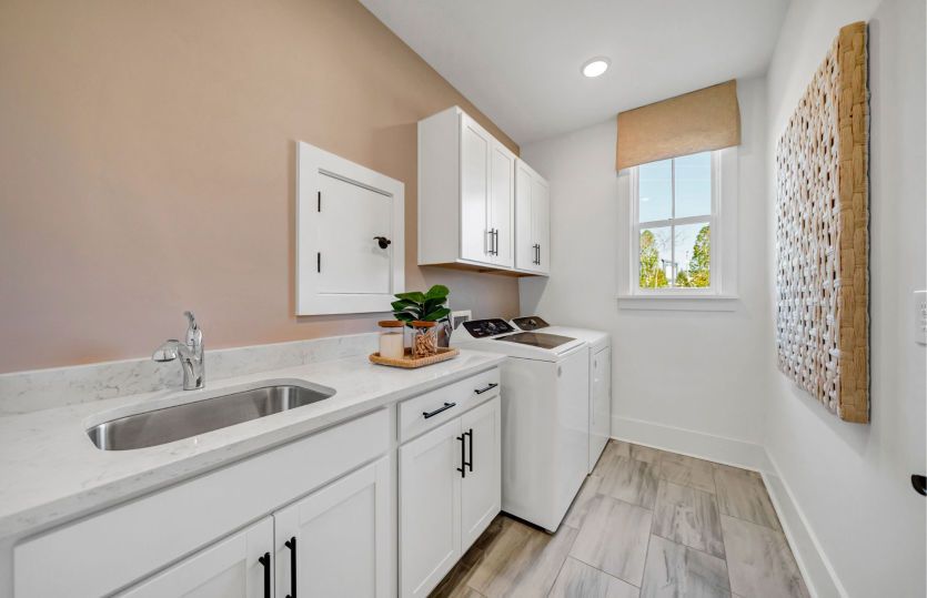 Store cleaning supplies and fold your linen in the laundry room.