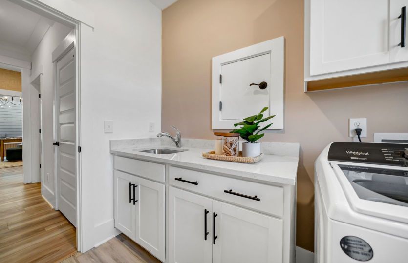 Laundry Room equipped with a sink.