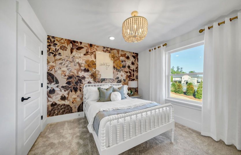 A charming secondary bedroom.