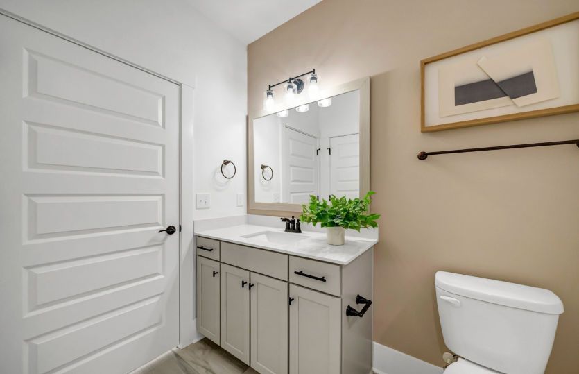 A compact yet elegant secondary bathroom, perfect for everyday use.