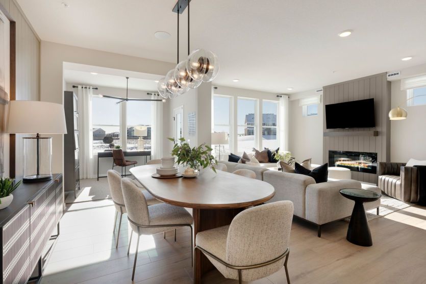 Standing in the Dining Room, Gazing Into the Gathering and Sunrooms