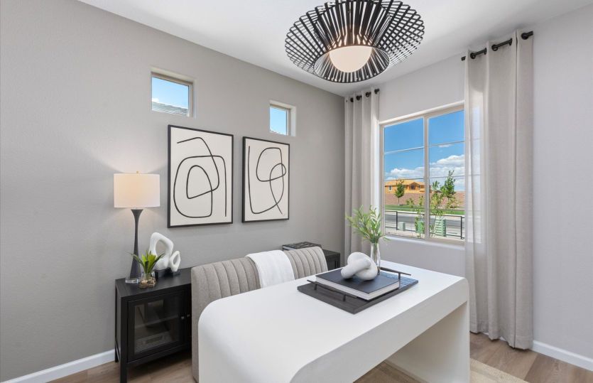 Flexible living space at the entry can be turned into a perfect home office.