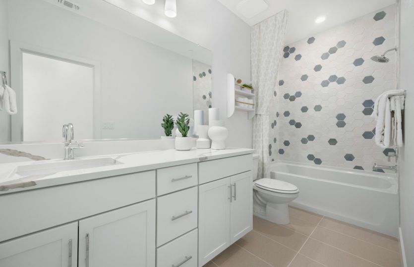 Secondary bathroom with shower and large vanity