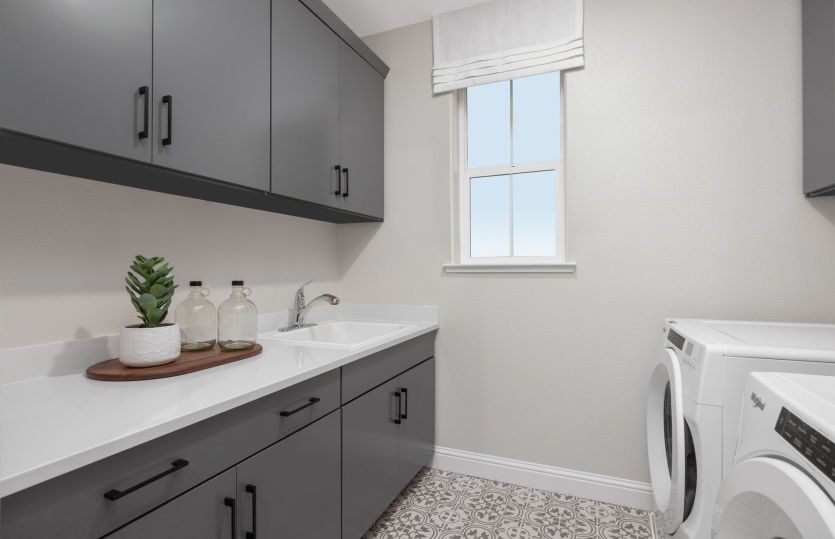 Spacious laundry room with storage