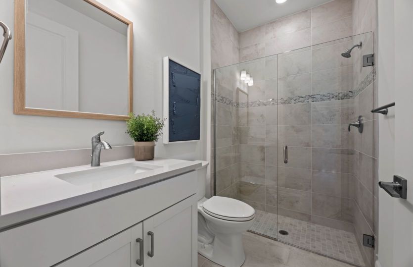 Secondary bathroom with glass shower