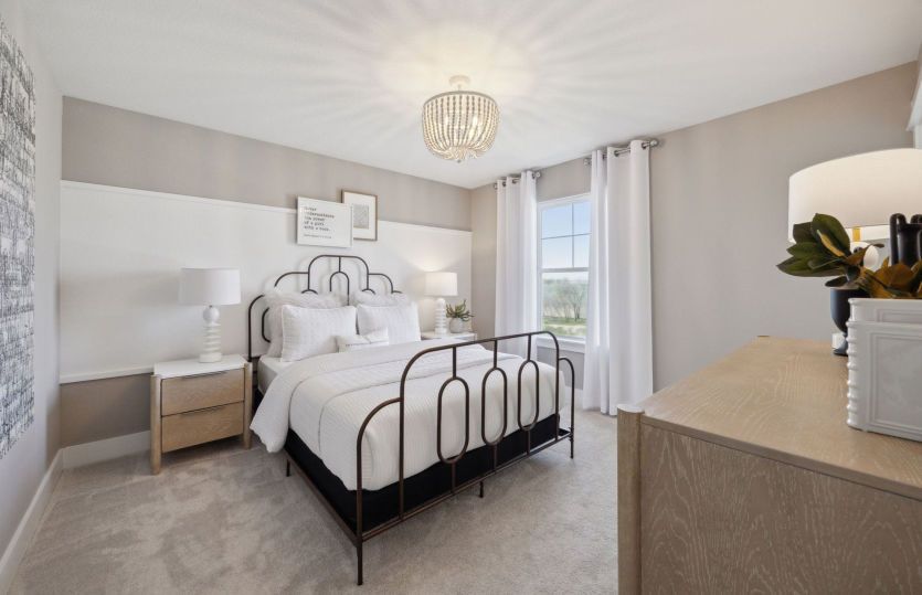 Spacious secondary bedroom *model representation