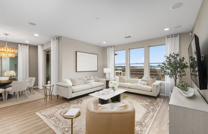 The gathering room with tons of natural light from three big windows.