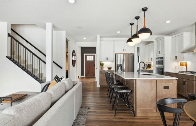 Looking back into the kitchen and foyer.