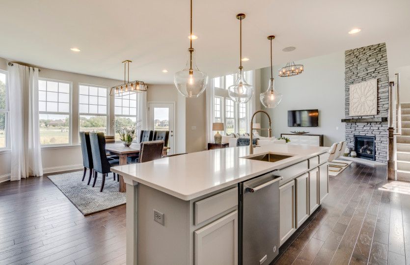 Open Concept Layout Featuring the Kitchen, Cafe and Gathering Room