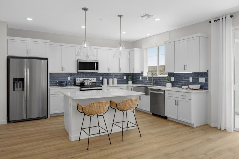 Open kitchen with decorative lighting