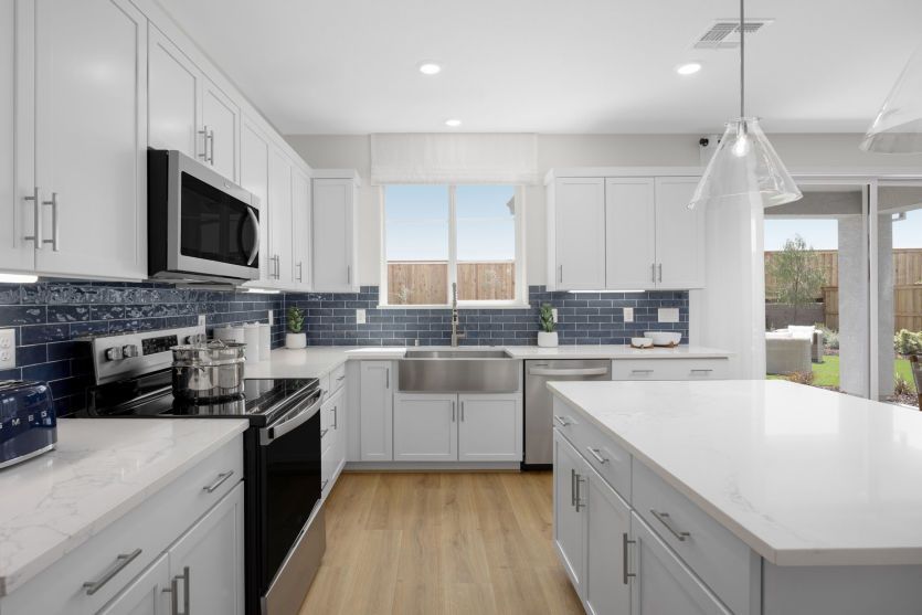 Bright kitchen with abundant cabinet space