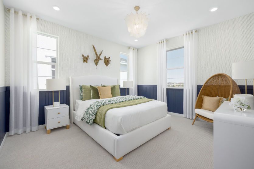 Secondary guest bedroom with large windows