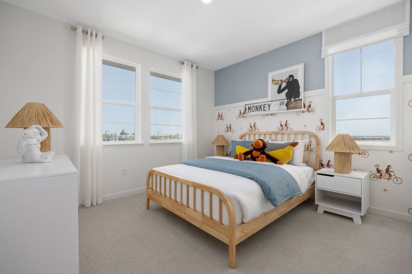 Secondary bedroom with natural sunlight