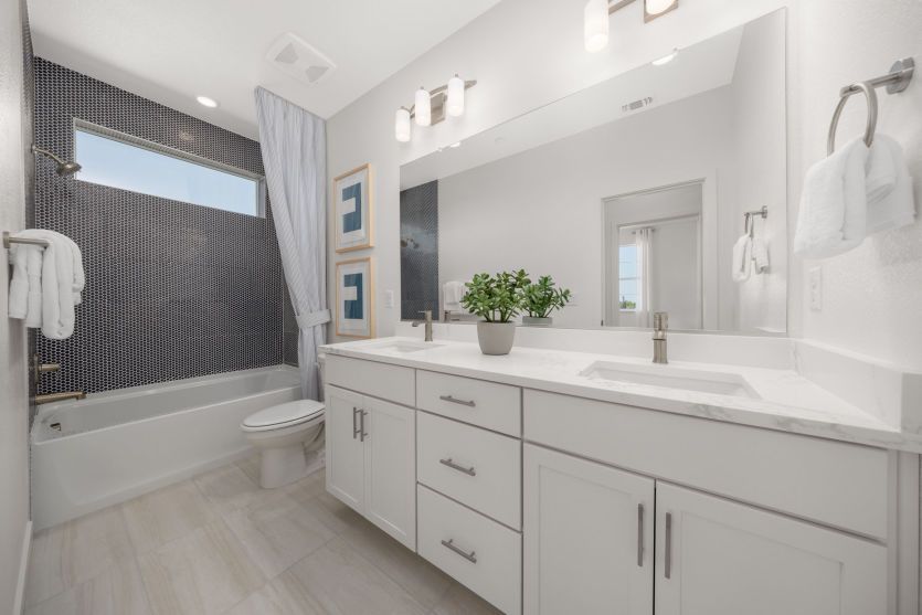 Secondary bathroom with double vanity