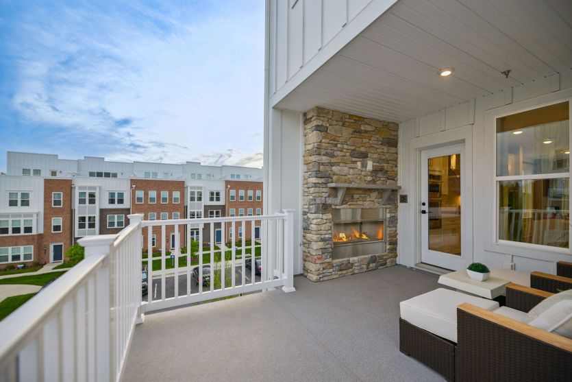 Expansive Balcony with Fireplace off the Kitchen