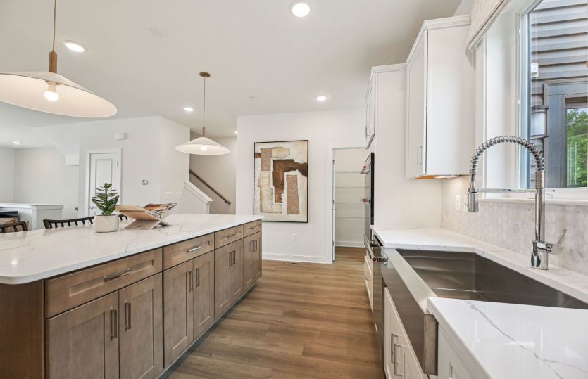 Rear Kitchen with Stainless Steel Appliances