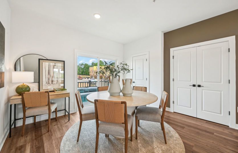 Café Space off the Kitchen with a Sliding Glass Door Leading to the Rear Deck