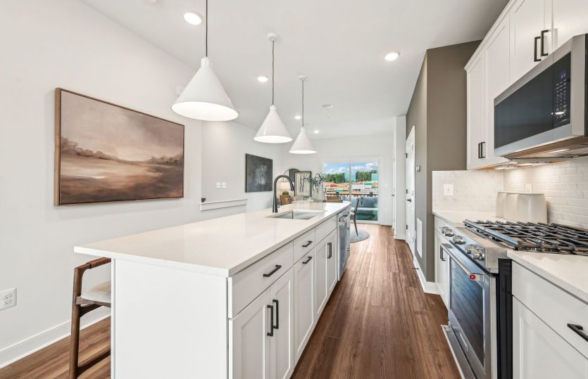Kitchen Features Stainless Steel Appliances and Plenty of Countertop Space