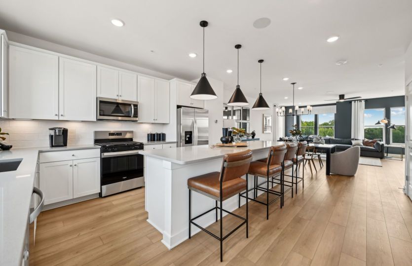Rear Gourmet Kitchen with Stainless Steel Appliances