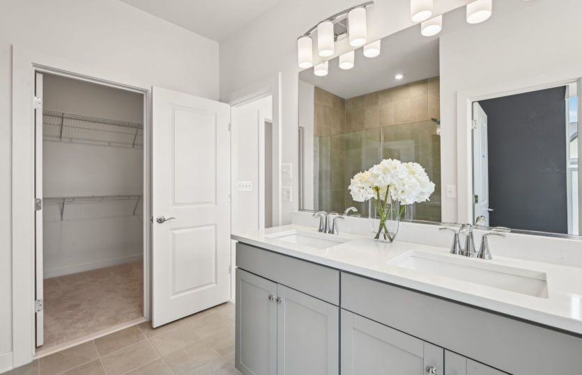 Owner's Bath with Double Sinks and a Walk-in Shower