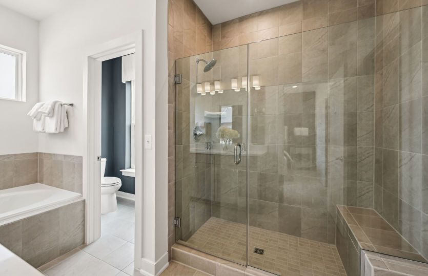 Owner's Bath with Frameless Walk-In Shower