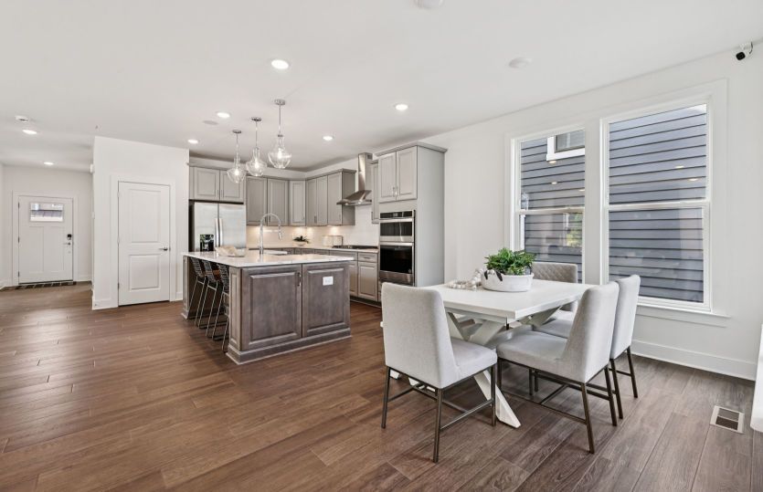 Café Overlooks the Kitchen and Gathering Room