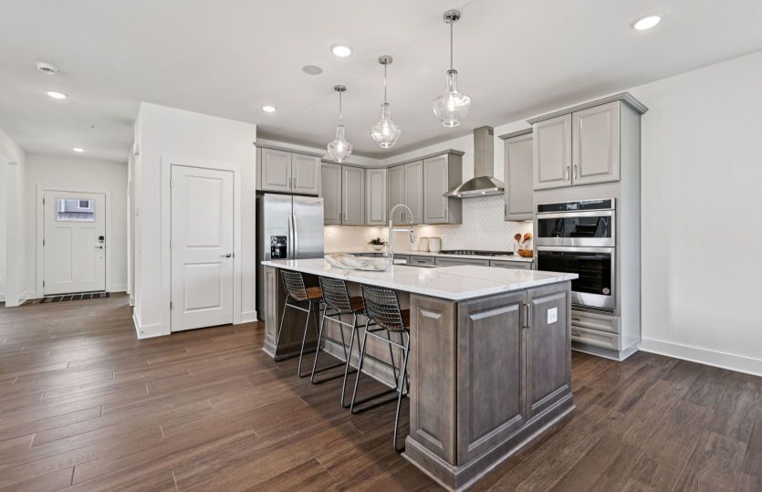 Kitchen with Quartz Countertops and KitchenAid Appliances