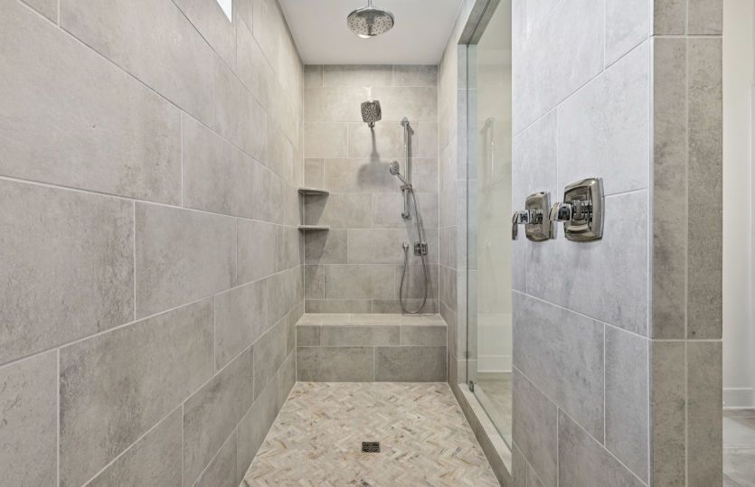 Owner's Bath with Frameless Glass Shower and Seat