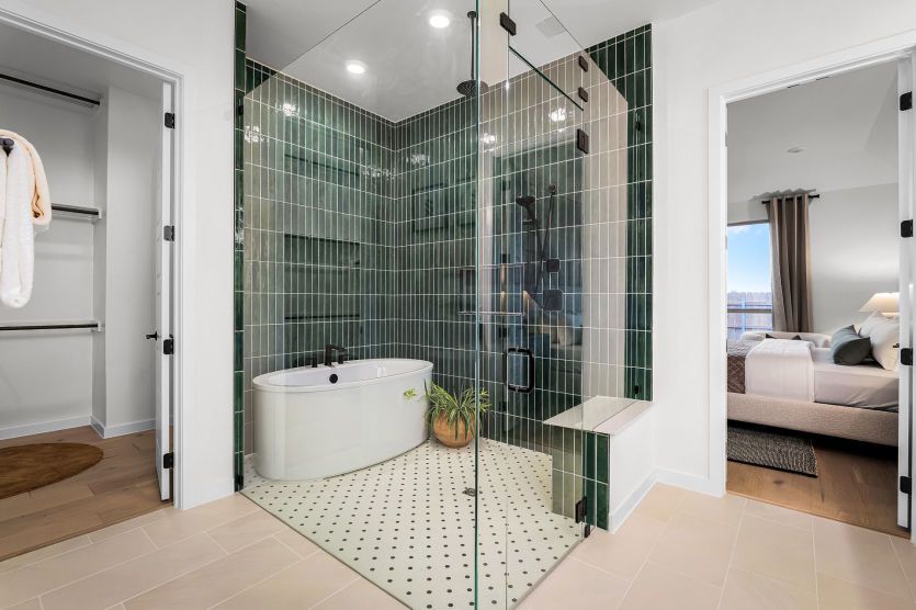 Primary Bathroom with Walk-In Shower and Free-Standing Tub