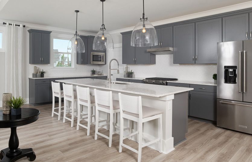 Kitchen with large center island  for additional seating opprotuntines.