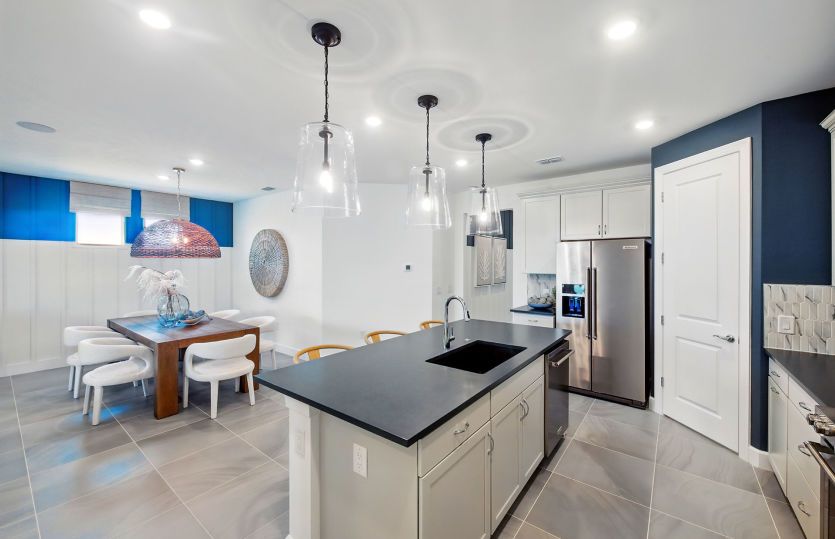 Island overlooking the gathering room of this new home