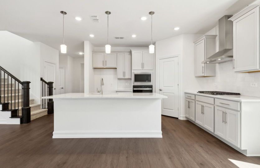 Airy kitchen with oversized island