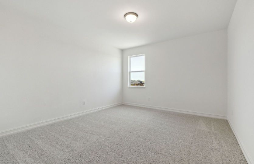 Spacious secondary bedroom with ample closet space