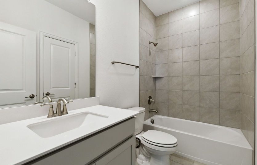 Spacious secondary bathroom with oversized shower