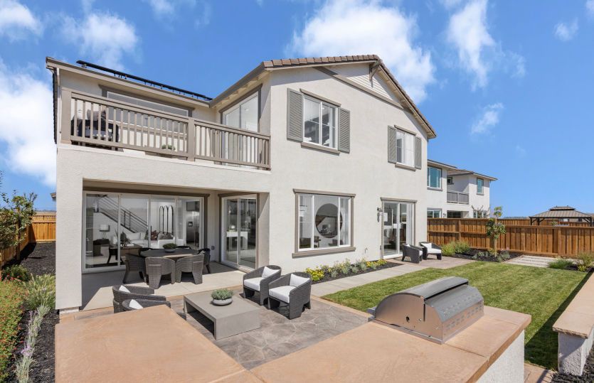 Large backyard with covered patio space