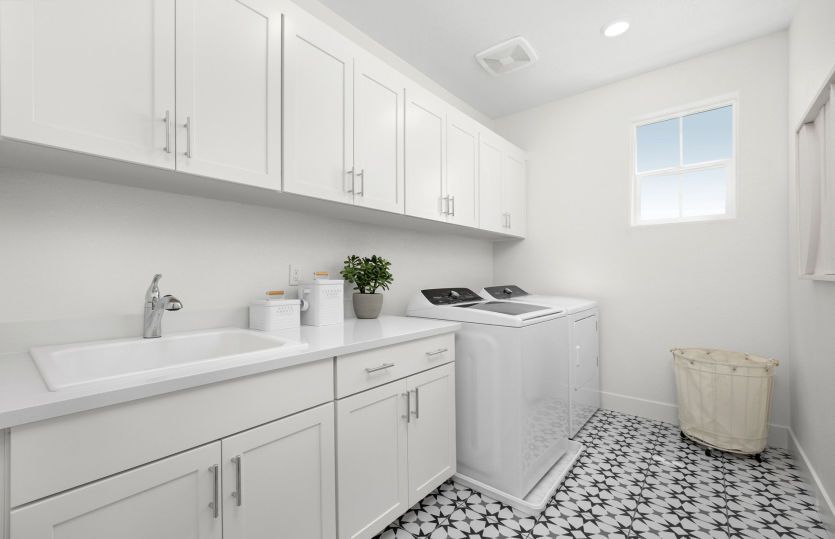 Second floor laundry room with ample storage