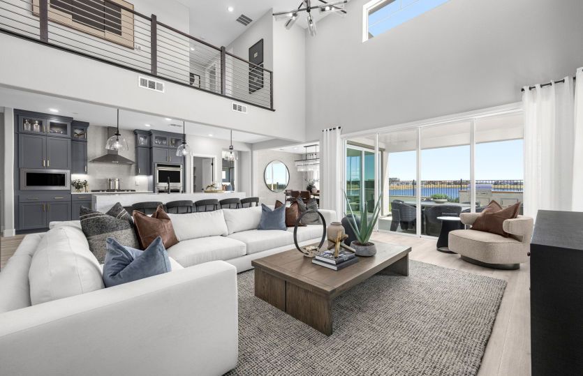 Open gathering room with double height ceiling
