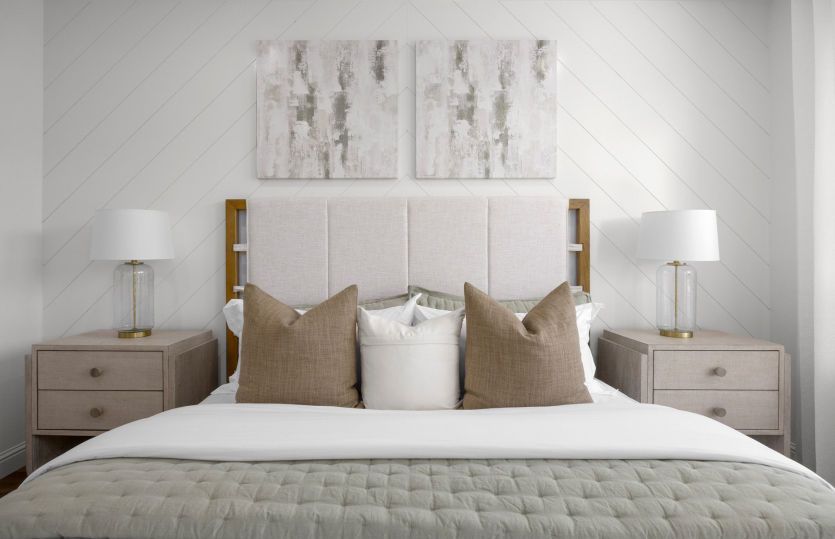 Primary bedroom with headboard wall detail