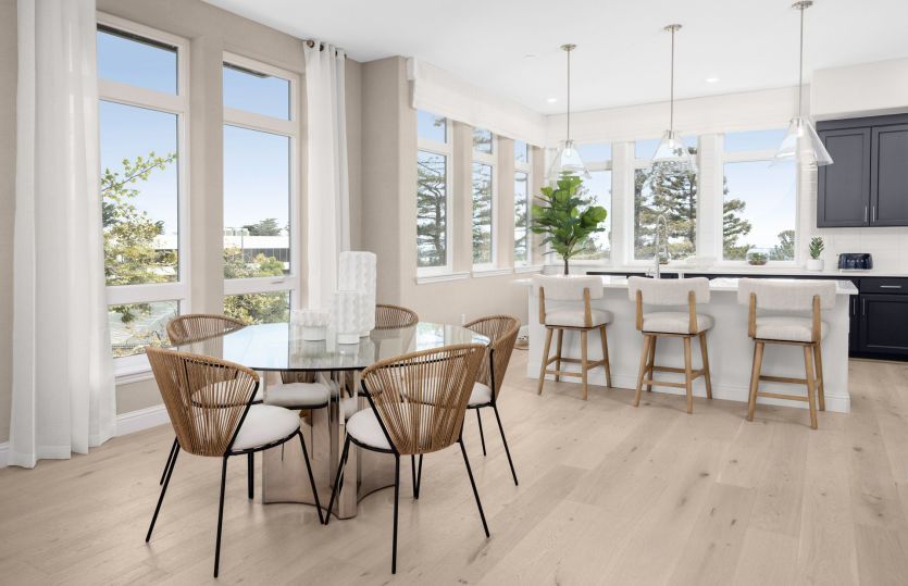 Stunning kitchen with large windows and natural sunlight