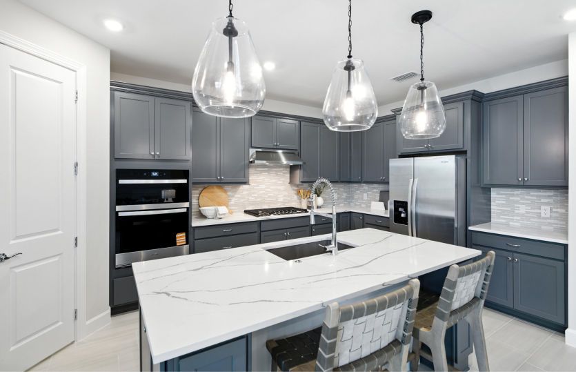 Open kitchen with decorative backsplash