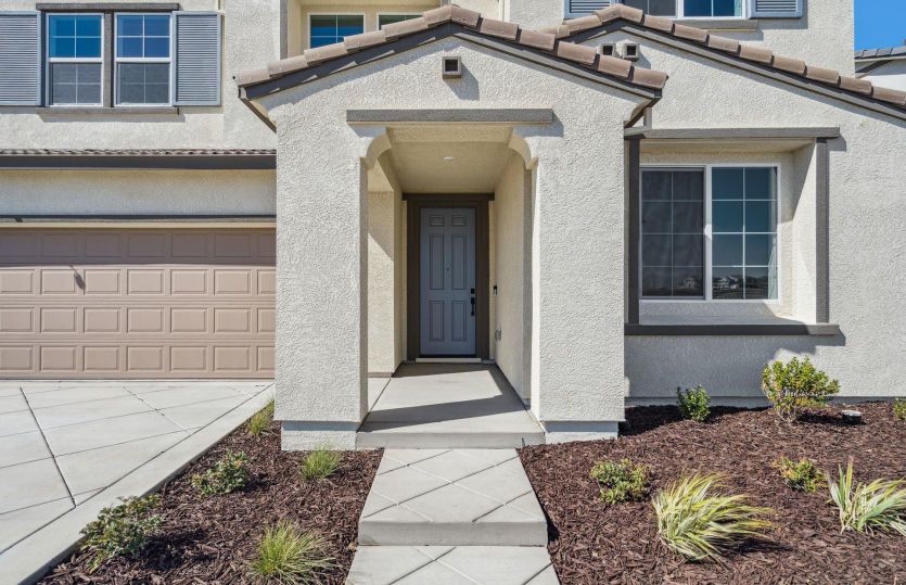 Entry with draught tolerant landscaping
